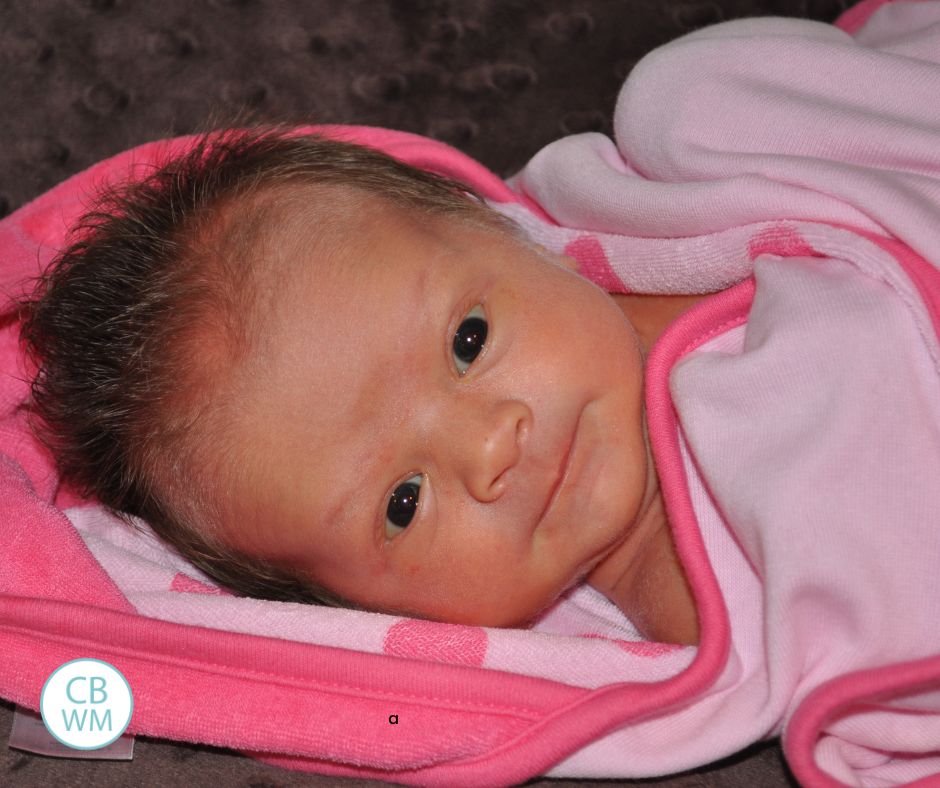 Newborn baby after a bath