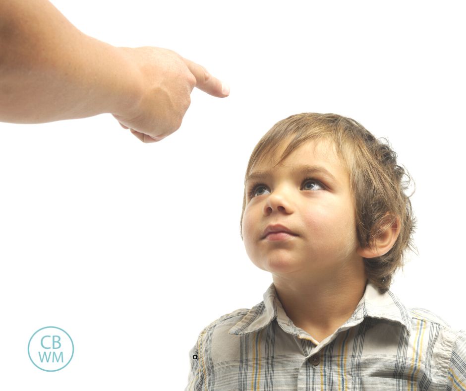 parent correcting a child