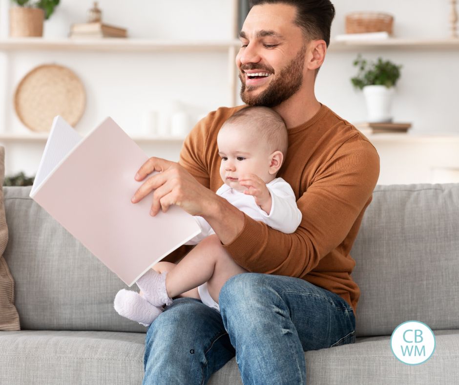 Parent reading to the baby