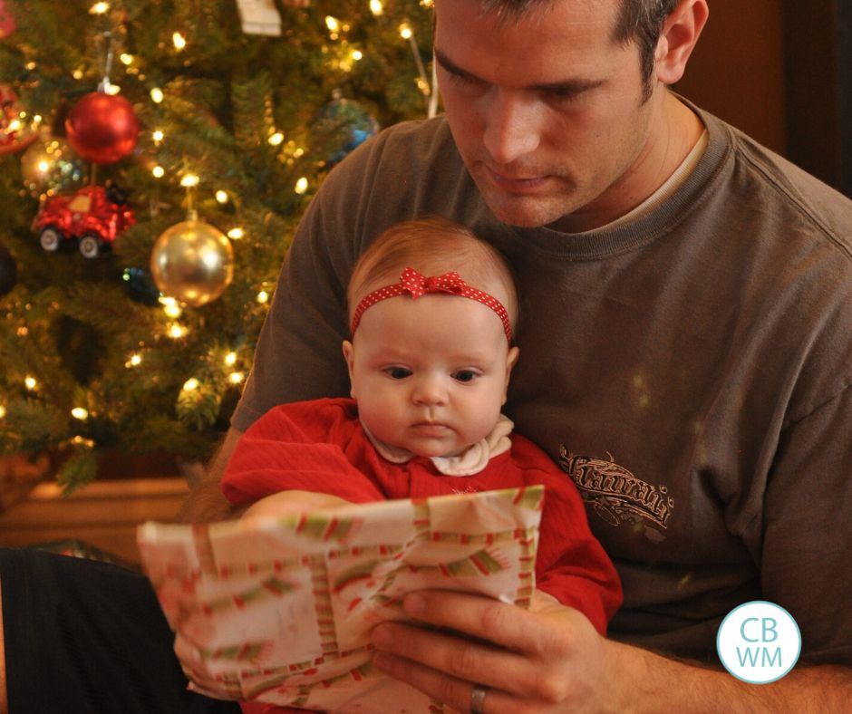 20 week old opening a Christmas present