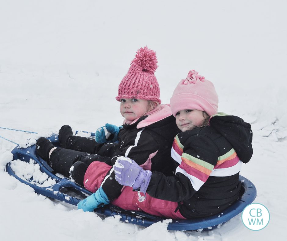 McKenna nd Kaitlyn sledding