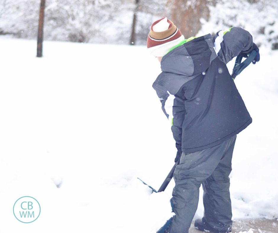 Brayden shoveling snow