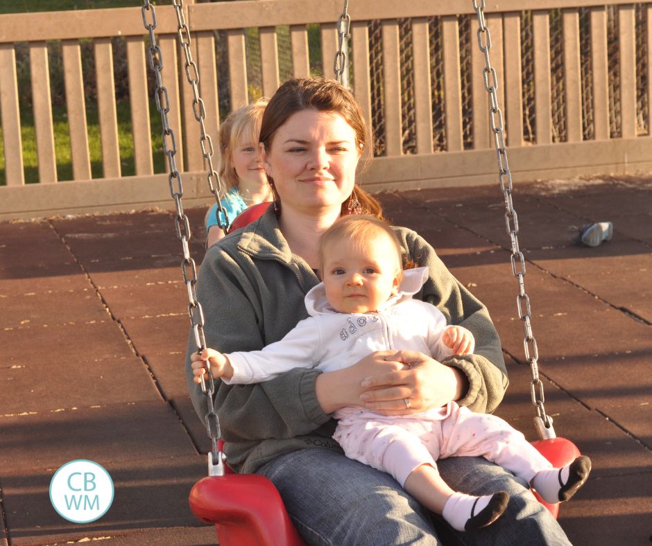 38 week old Brinley swinging with her mom