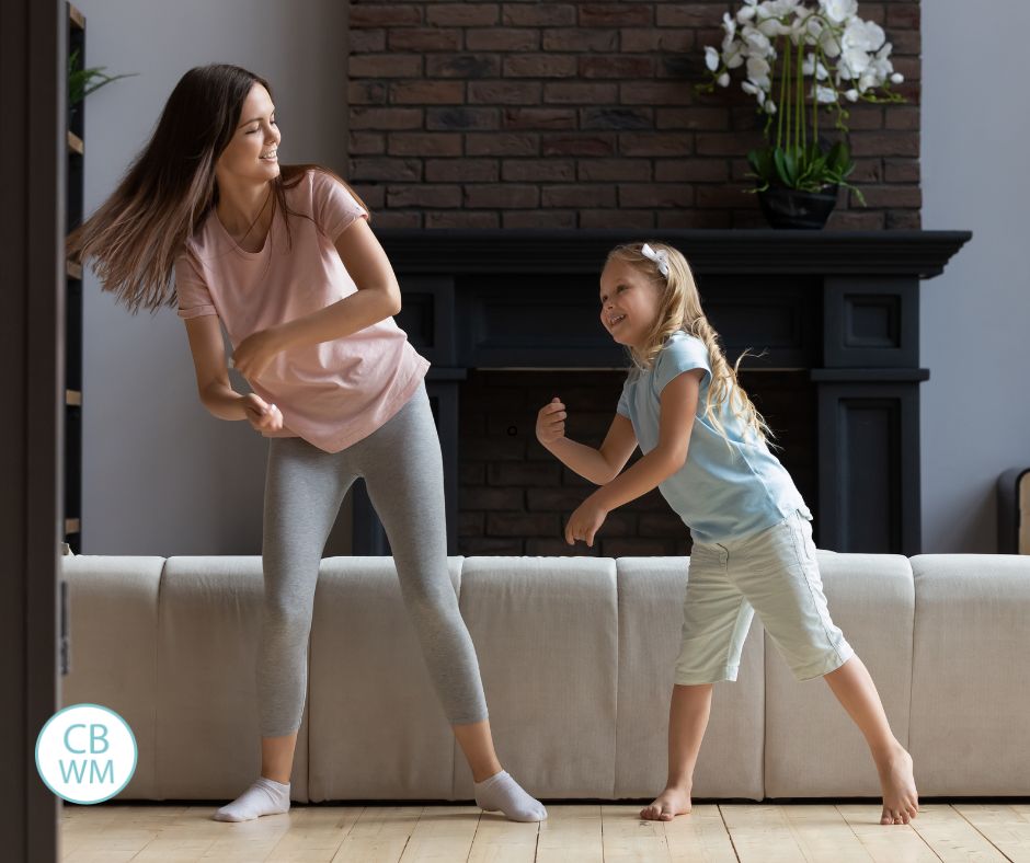 mom and daughter having fun at home