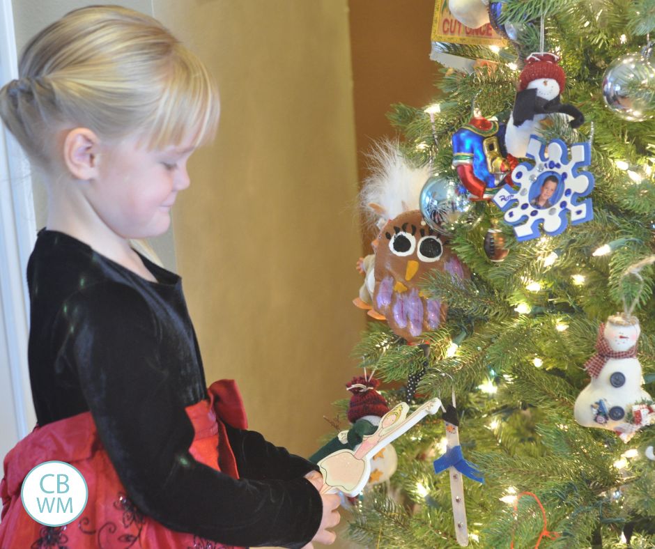 McKenna looking at the Christmas tree