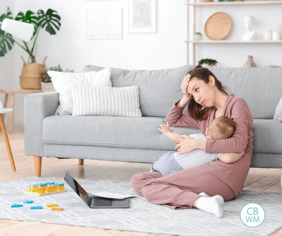 Mom feeding baby on floor