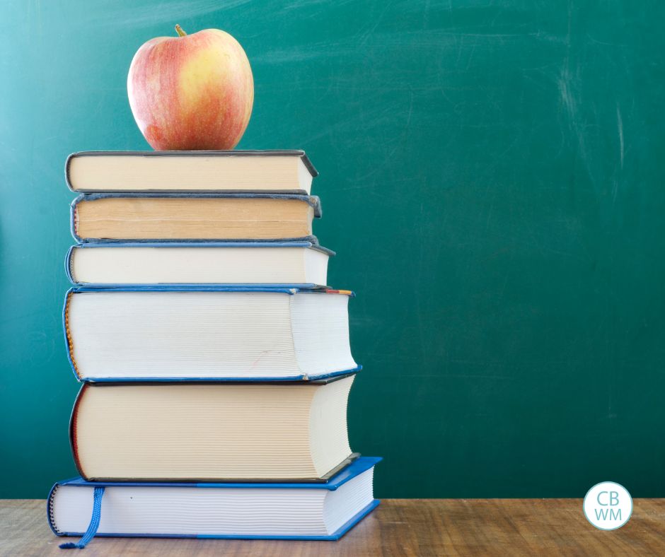 Stack of books with an apple on top