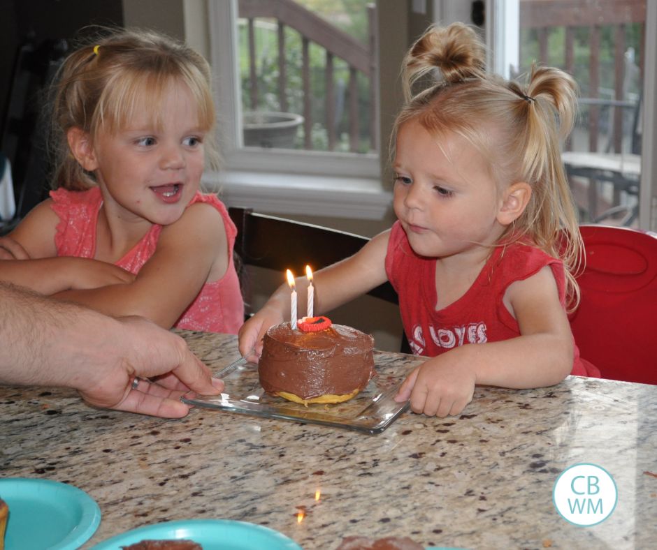 Brinley blowing out candles on her birthday