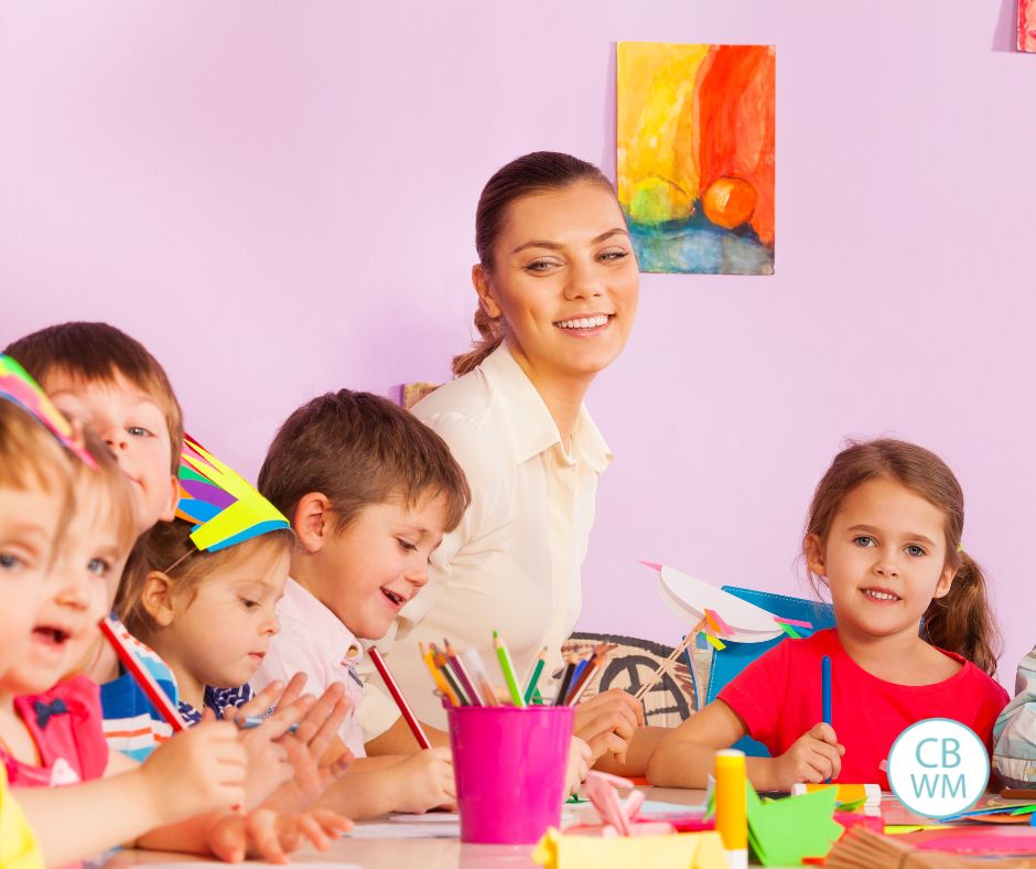Mom with a group of kids at school during a party