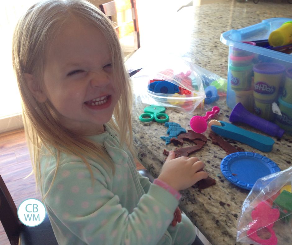 Brinley playing with playdoh