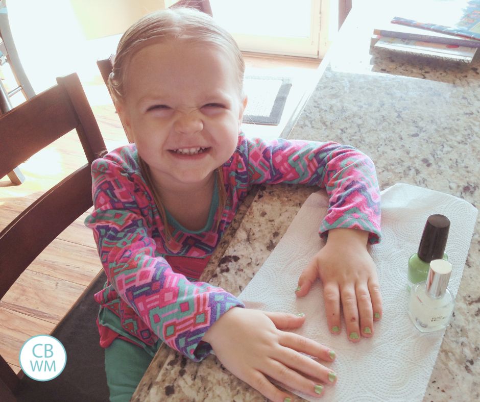 32 month old Brinley getting her nails painted