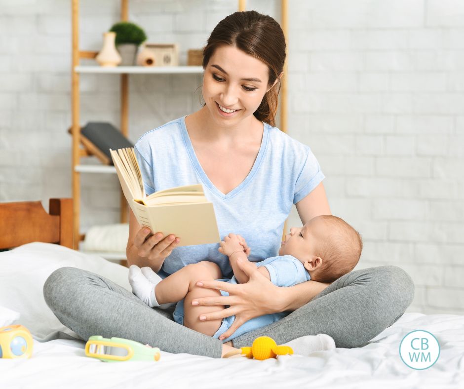 Mom reading ot her infant