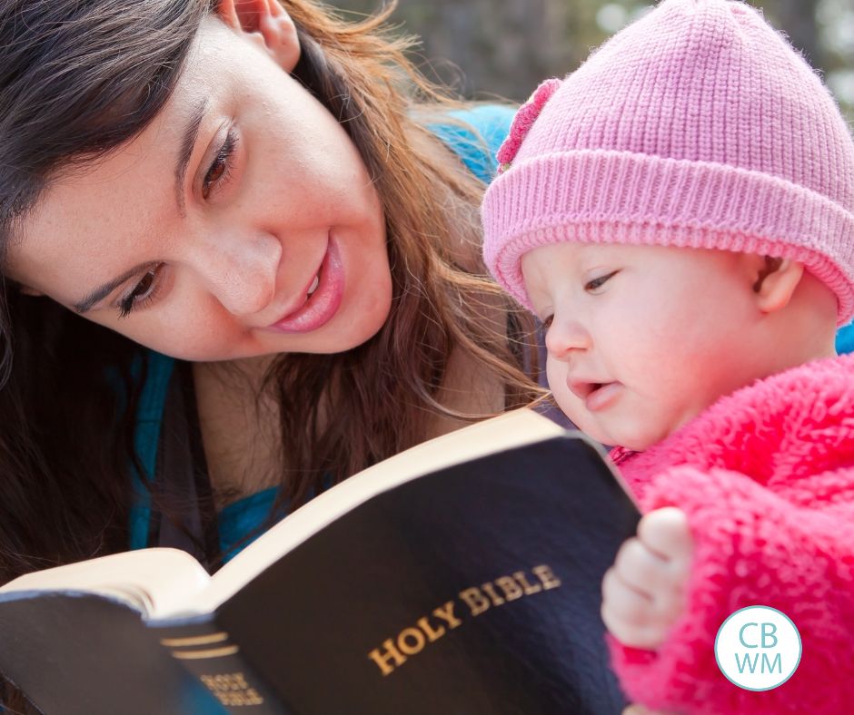 Mom reading Bible to her child