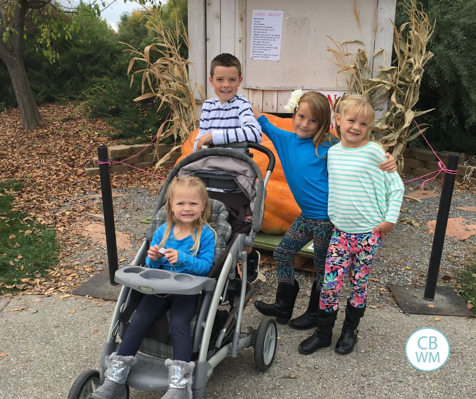 All 4 kids at a fall activity
