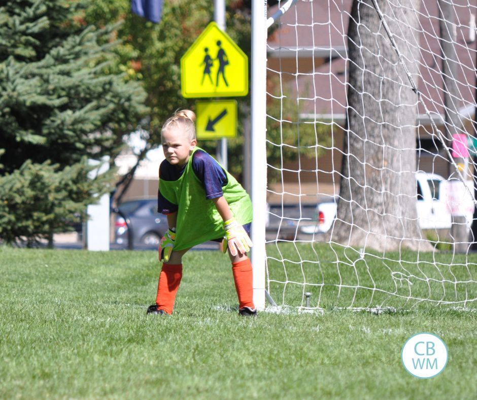 McKenna playing the position of keeper during a soccer game