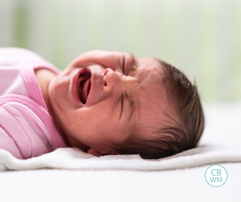 Baby crying in a crib