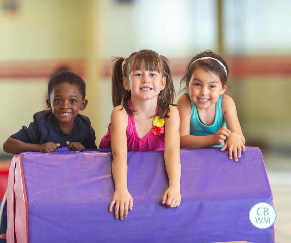 Kids on a mat in the gym