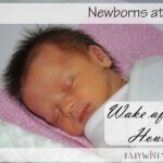 Newborns at night hero image with newborn sleeping in bed