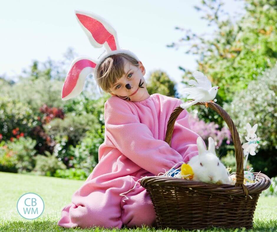child dressed as a bunny with an easter basket
