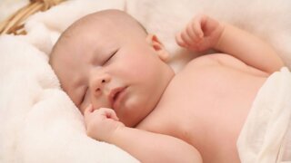 Baby sleeping in basket