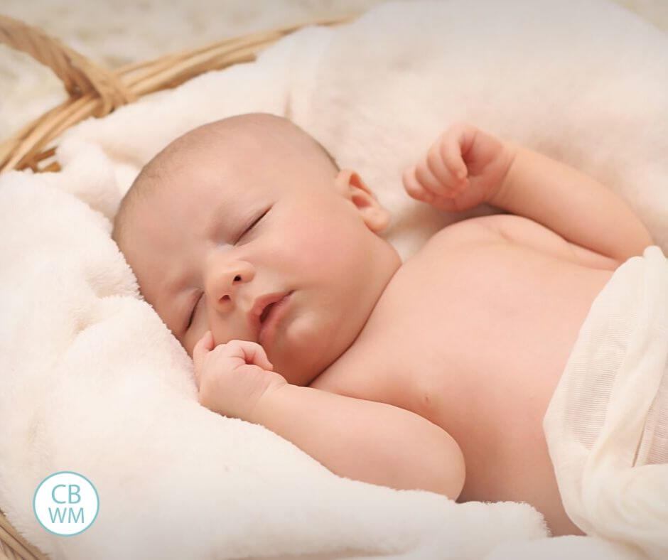 Baby sleeping in basket