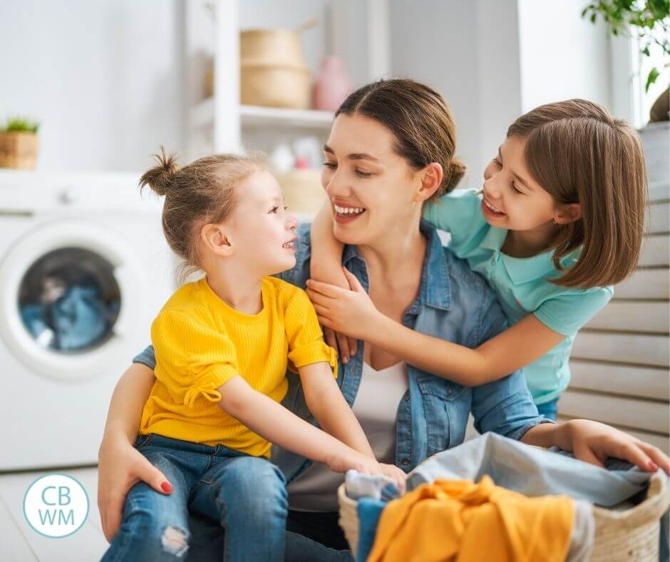 Mom and preschoolers doing chores