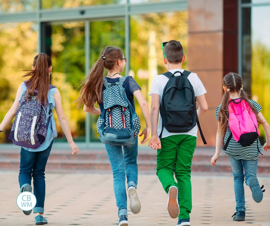 Kids skipping into school