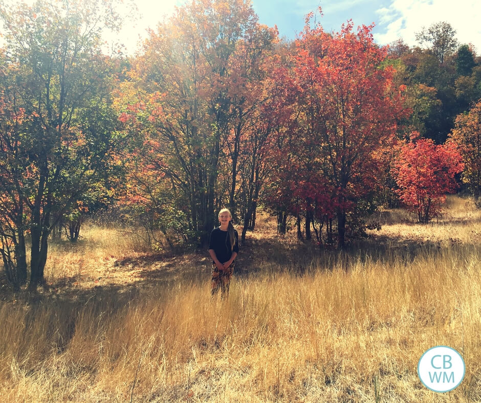 McKenna in the mountains with fall foliage 