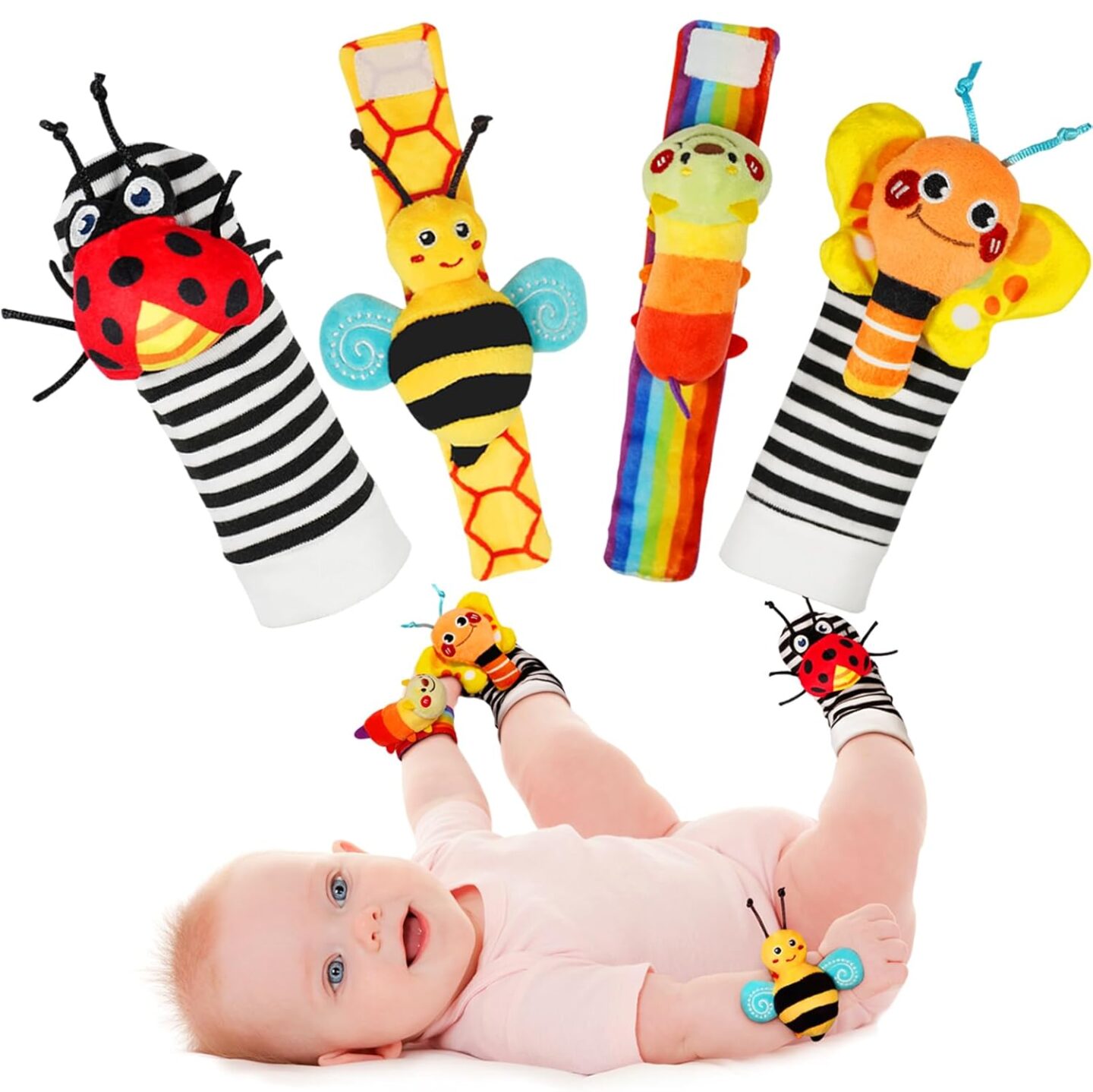 baby with wrist rattle