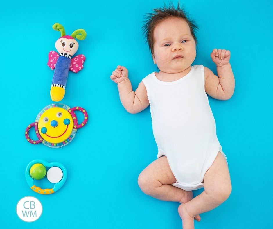 Newborn with toys