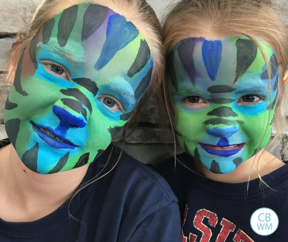 Two girls with painted faces