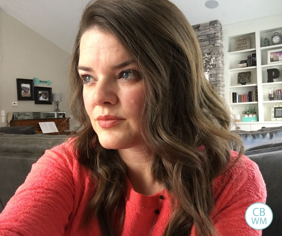 Woman with hair curled by a curling wand