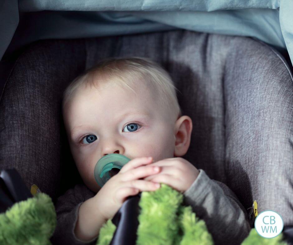 Baby in carseat looking sleepy