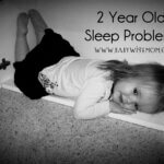 Two year old sleep problems text with a picture of a toddler lying in a cupboard.