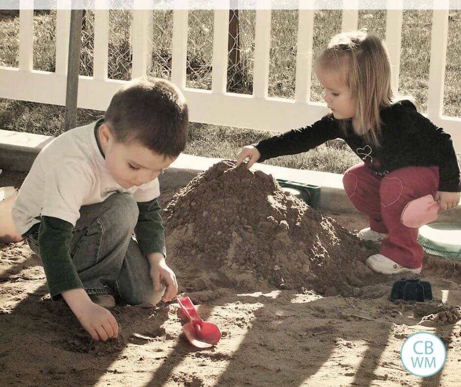 A brother and sister playing with each other