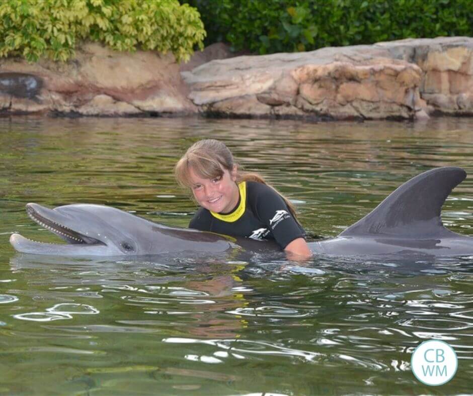 12 year old tween with a dolphin