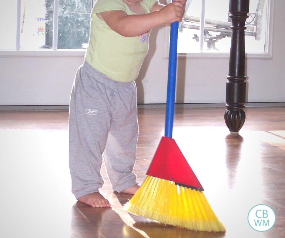 Toddler doing chores