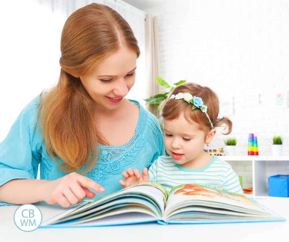 Mom and daughter reading a book