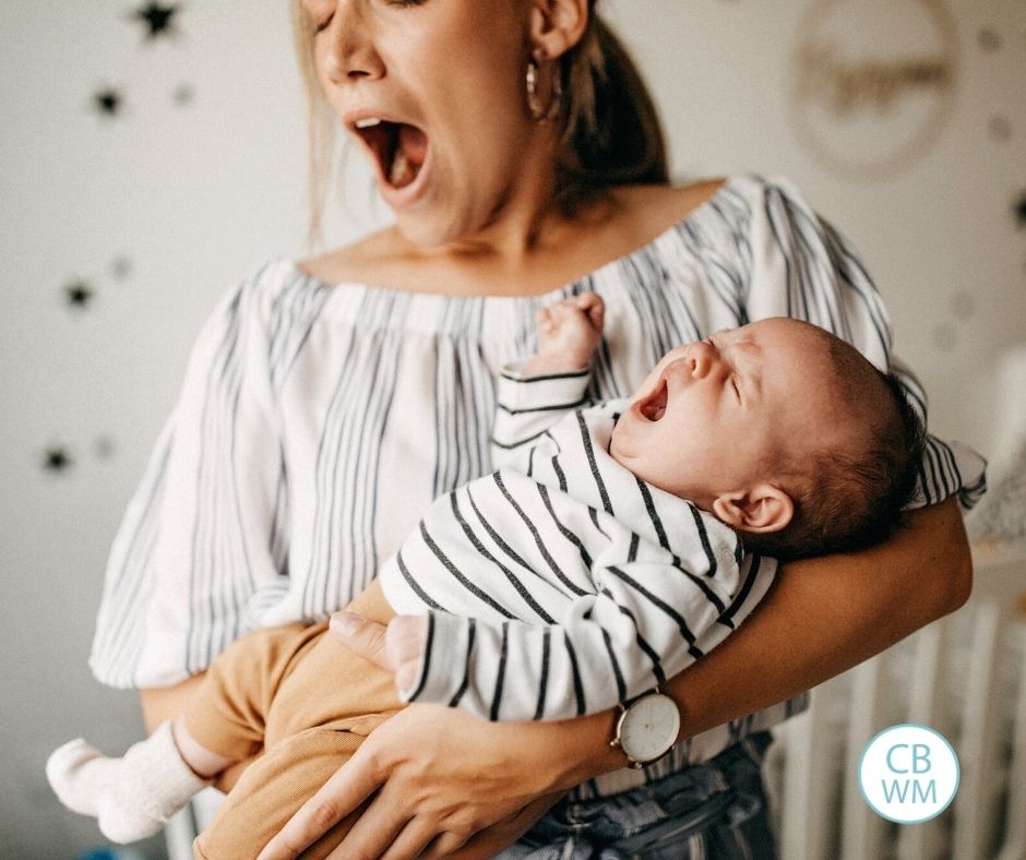 Mom and newborn both yawning