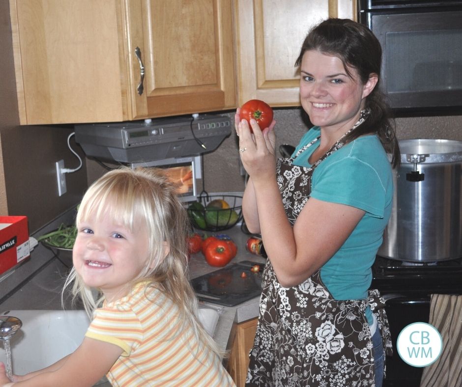 Mom and daughter cooking together