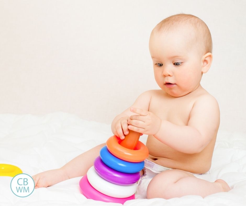 7 month old baby playing with toys