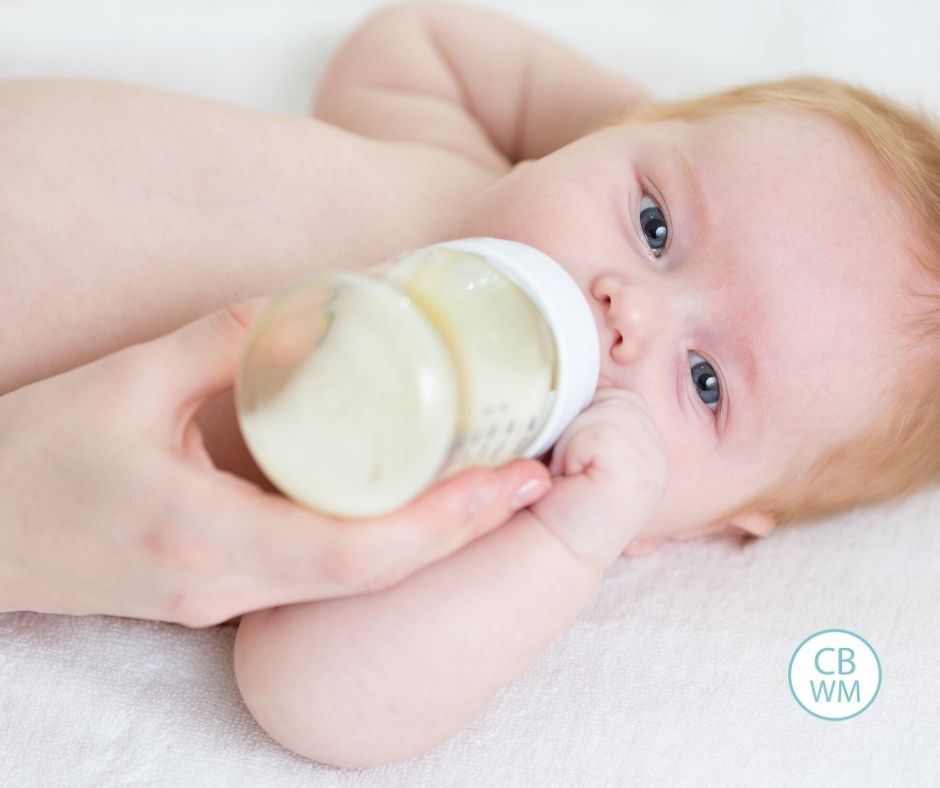 baby eating from a bottle