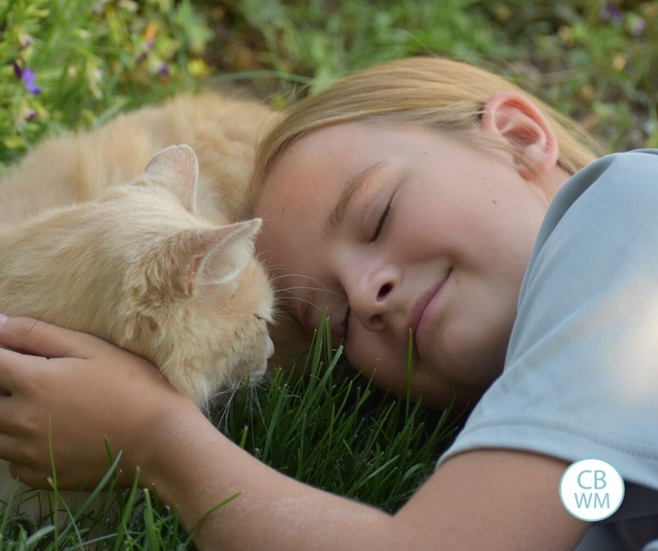 Brinley at 9 years old with her cat