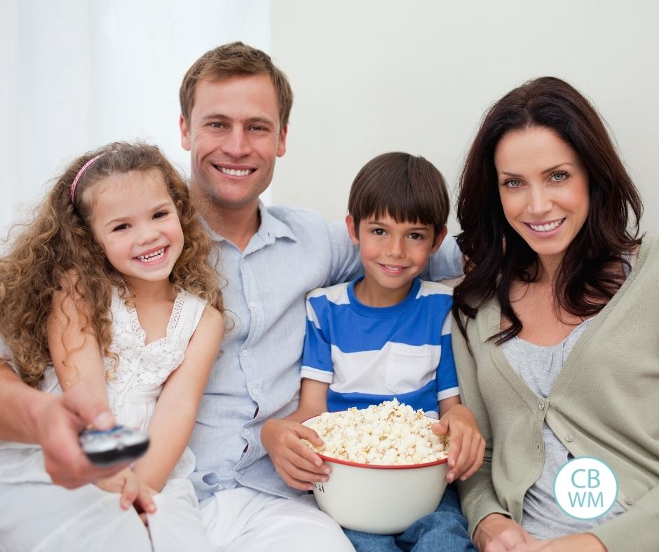 Family watching movies together