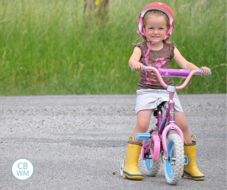 4 year old Kaitlyn on a bike