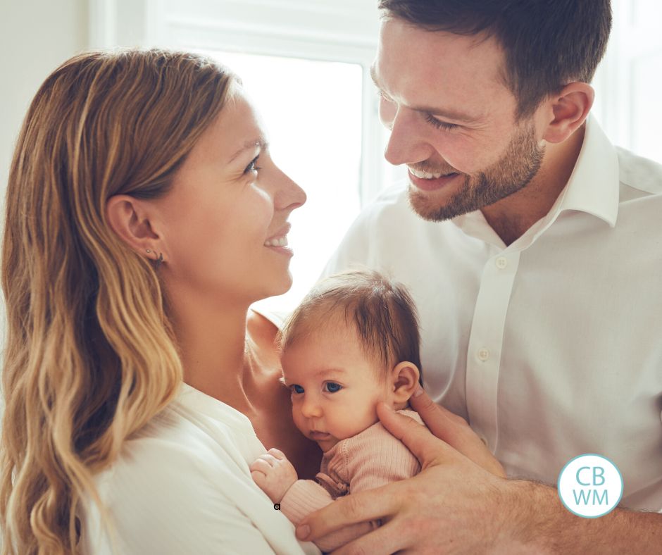 young parents with newborn baby