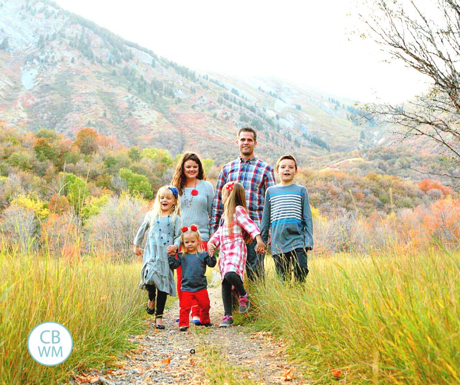 Family walking. 4 children and two parents.