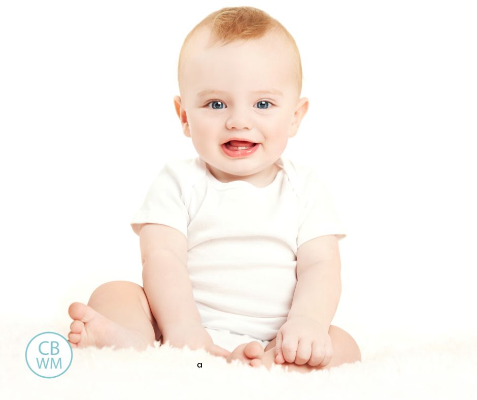 Baby smiling with a white background