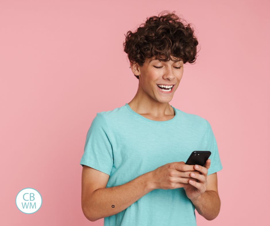 teenager using a cell phone