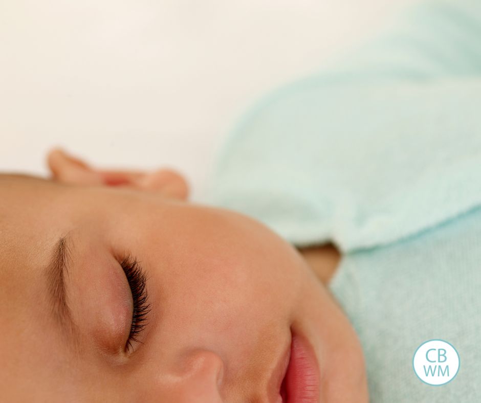 Baby sleeping and facing camera